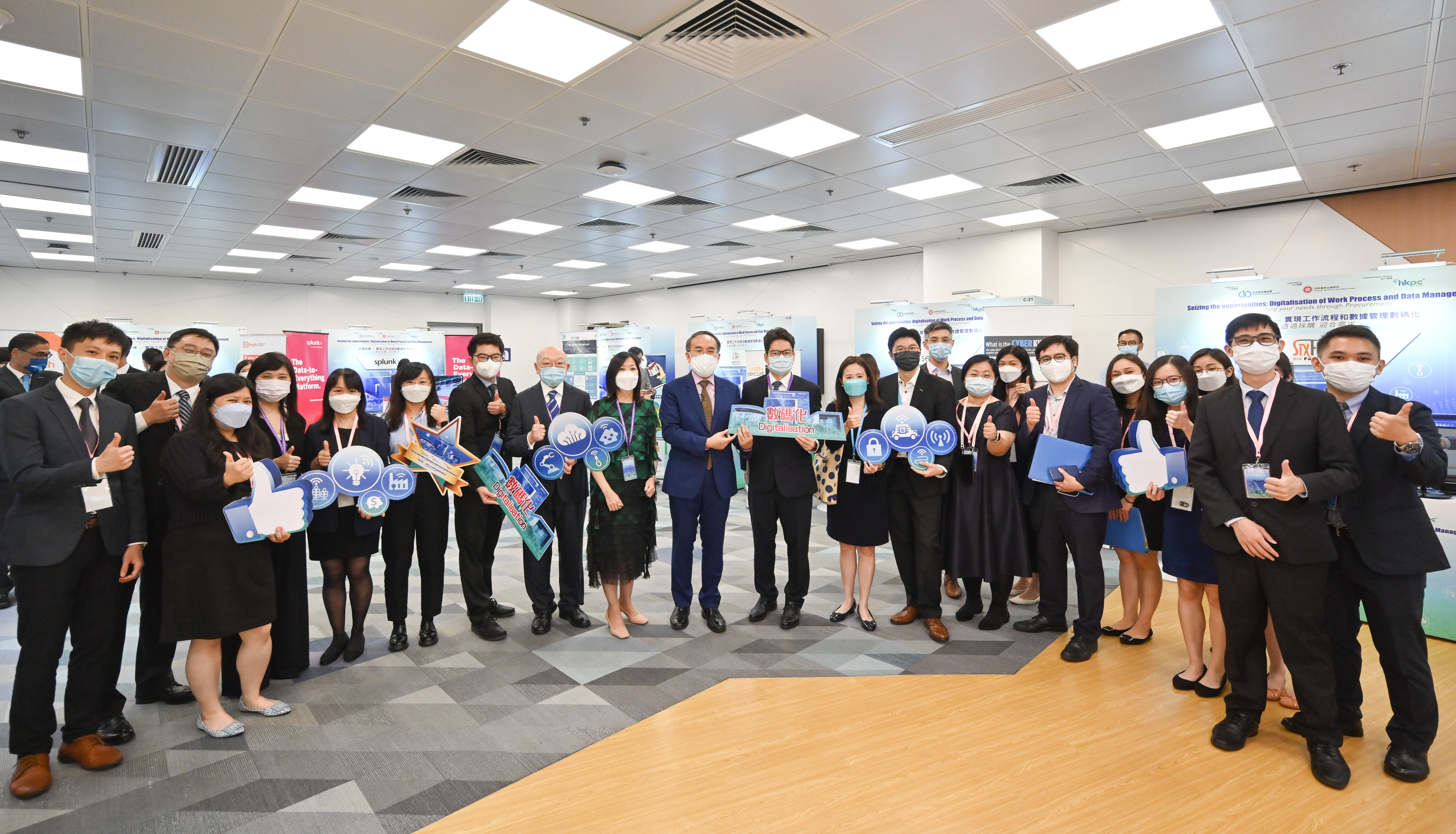 Group photo of Mr Christopher and Miss Cathy Chu with FSTB and GLD colleagues